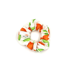 oranges and leaves on white background scrunchie